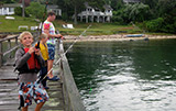 Father and sons fishing for snapper, photo provided by Susan Binder