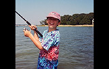 Alec Montgomery fishing for snapper in Coecles Harbor, photo provided by Doug Sherrod