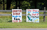 The signs all over the island for the Snapper Derby
