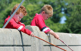 Two boys determined to catch a snapper at Second Bridge