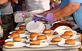The juicy burgers that were being made, kids get them free and served with bottled water
