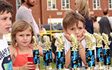The kids checking out the trophies to be won