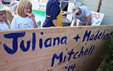 Second place winners, Juliana & Madeline Mitchell wrote their names on the back of their board, but some people still forget
