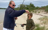 Pops & Oscar Sheehan with their catch at shell beach
